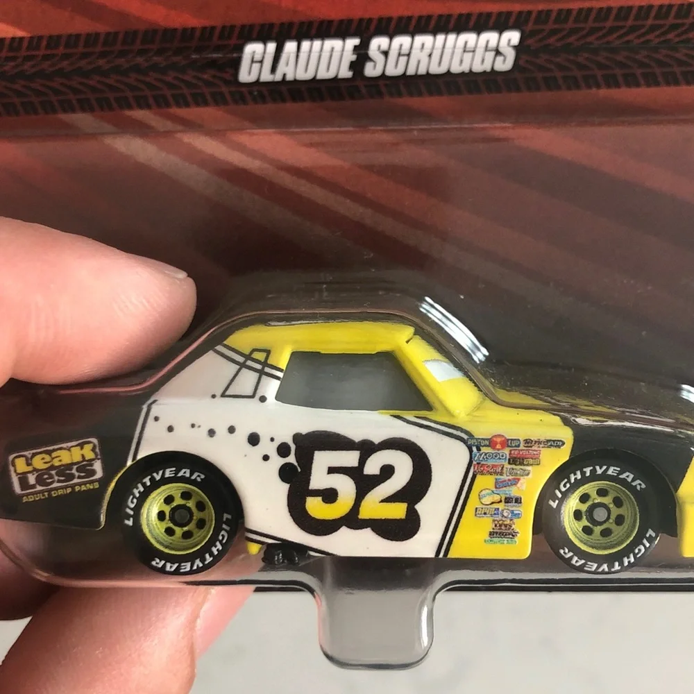 Mattel Disney Pixar Cars Claude Scruggs Toy Car - Yellow and Black